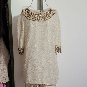 Elegant Cream Dress with Gold Accents